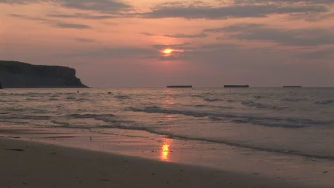 Sunset on D-Day landing beach code named Gold Beach Normandy, FRANCE Stock Footage 101981481