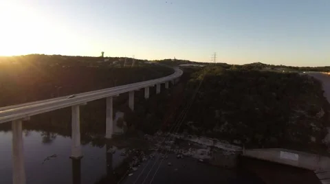 Sunset at the Dam high fly over of road Stockbeeldmateriaal 42356613