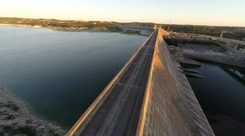 Sunset at the Dam medium high fly over of road Stock-Footage 42356981