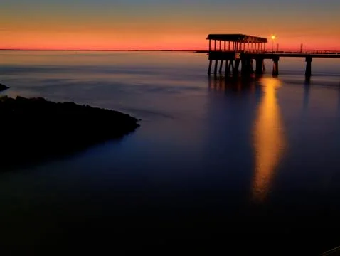 Sunset on a dark background Stock Photos