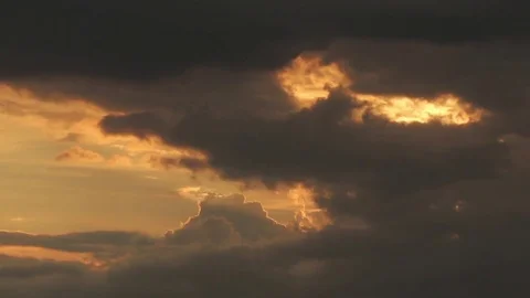 Sunset with dark clouds Stock Footage 76757716