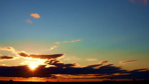 Sunset with dark Clouds Time-lapse GT5072 Stock Footage 162397142