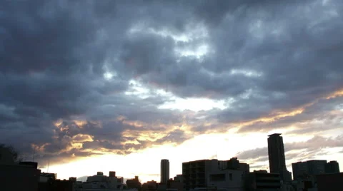 Sunset dark cloudscape over the buildings of Tokyo. Stock Footage 61762932