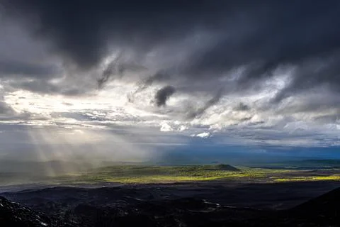 Sunset dark sky clouds twilight landscape and sun rays break through the clouds, Stock Photos