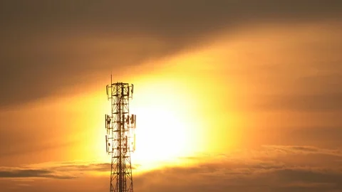 Sunset on dark telecommunication station silhouette sky of summer background Video stock 129707404