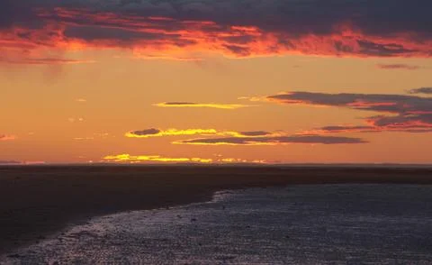 Sunset darkness at the beach Stock Photos
