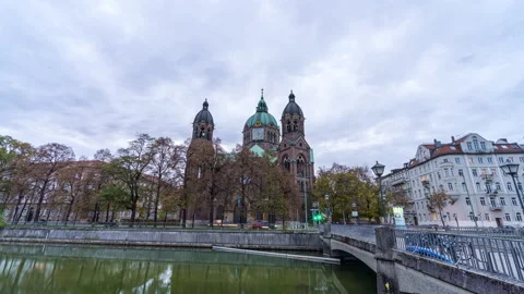 Sunset day to night Hyperlapse Isar river and St Lukas Church, Munich, Germany Stock Footage 222925708
