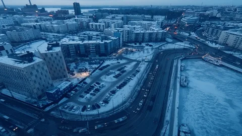 Sunset from day to night time lapse with traffic, buildings, city lights, winter Video stock 86611250