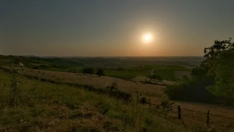 Sunset day to night transition eclipse time lapse farm agriculture field rural Stock Footage 347392710