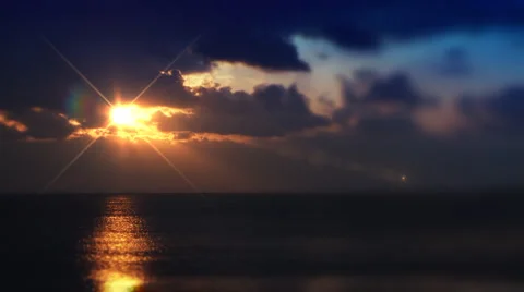 Sunset on deep blue cloudy sky, sea. Stock Footage 3136385