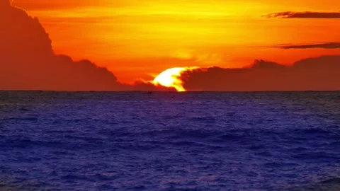 Sunset in deep ocean, silhouette mountain cape long distance with beautiful c Stock Footage 130893001