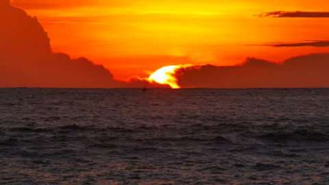 Sunset in deep ocean, silhouette mountain cape long distance with beautiful c Stock Footage 130893030