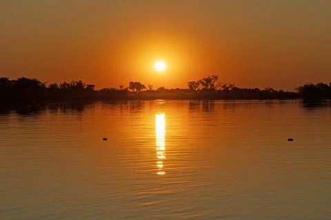 Sunset Deep in the Okavango Delta Stockfoto's