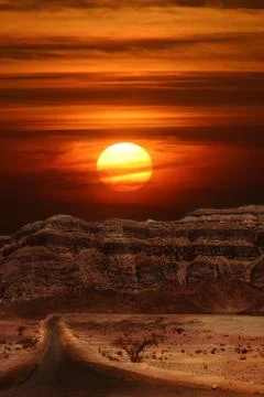 Sunset in desert. Stock Photos