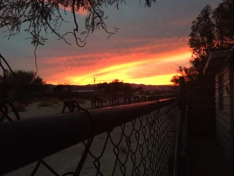 Sunset On A Desolate Street Stock Photos