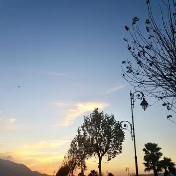 Sunset dips below the horizon 스톡 사진