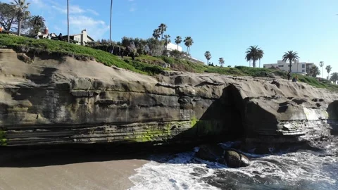 Sunset Disk at San Diego CA Coast of the Pacific Ocean Aerial Forward Stock Footage 153761391