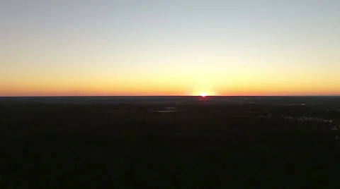 Sunset in the Distance (Aerial View) Stock Footage 46266763
