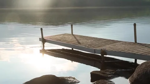 SUNSET DOCK LENS FLARE Stock Footage 259320655