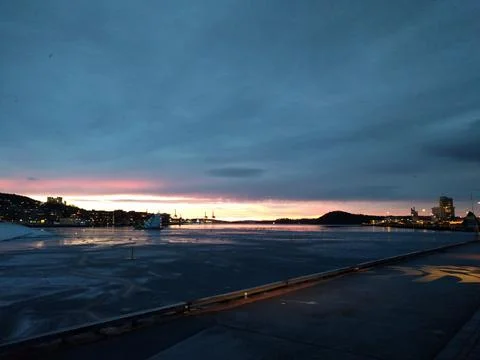 Sunset by the docks in the city in the winter Stock Photos
