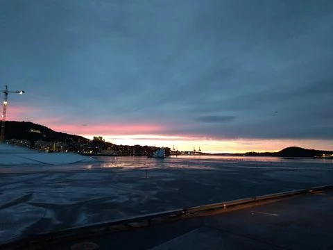 Sunset by the docks in the city in the winter Stock Photos