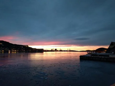 Sunset by the docks in the city in the winter Stock Photos
