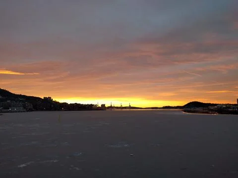 Sunset by the docks in the city in the winter Stock Photos