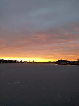 Sunset by the docks in the city in the winter Stock Photos