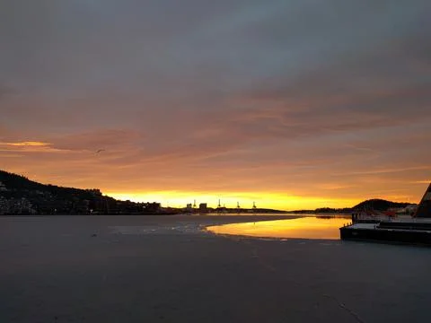 Sunset by the docks in the city in the winter Stock Photos
