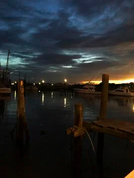 Sunset at the docks of an old maessh Stock Photos