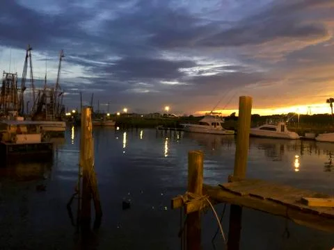 Sunset at the docks of an old marsh Stock Photos