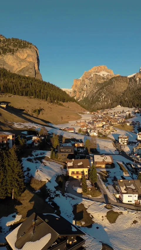 Sunset Dolomite's winter nature small town golden hour Video stock 304030659