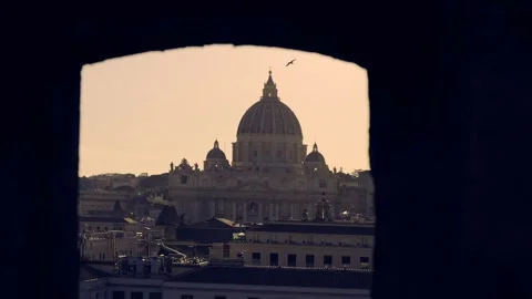 Sunset on the dome of St. Peter's in Rome. Aerial view, backlit close-up of t Stock-Footage 330050648