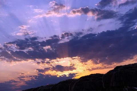 Sunset dramatic with beautiful layer of pastel violet clouds sky background Stock Photos