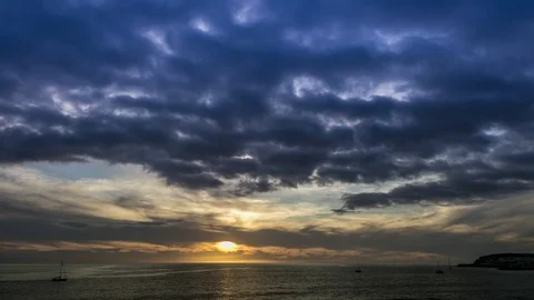 Sunset with dramatic clouds on Canary Islands, Time lapse Stock Footage 125490944