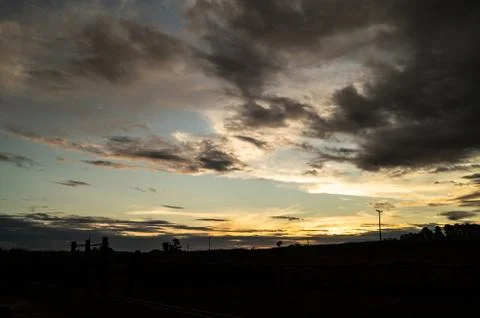 Sunset with dramatic sky with clouds Stock Photos