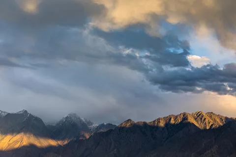 Sunset dramatic sky in Karakorum mountains Stock Photos
