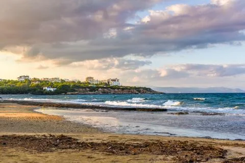 Sunset with dramatic sky over the beach at Rafina, Greece Stock Photos