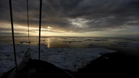 Sunset on the drifting ice floe  on the Arctic Ocean - Time lapse Video stock 104960501