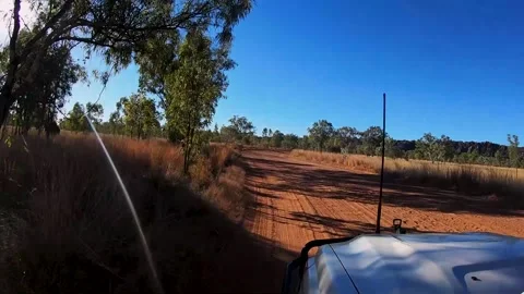 Sunset driving  4WD in australian Outback gravel road Stock Footage 325081915