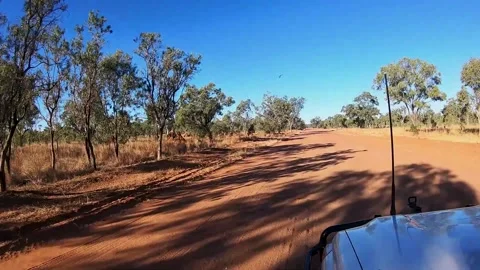 Sunset driving  4WD in australian Outback gravel road Stock Footage 325081931