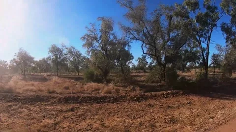 Sunset driving  4WD in australian Outback gravel road Stock Footage 325081940