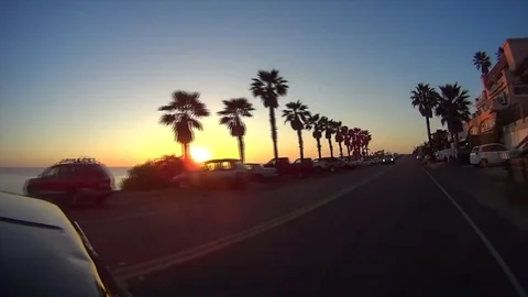 Sunset Driving above SWAMIS Encinitas California Stock Footage 70673242