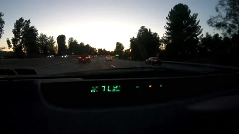 Sunset driving POV Stockbeeldmateriaal 142049121