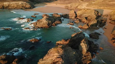 Sunset, the drone flies over isolated rocks of the seaside in France Stock Footage 164589388