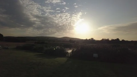 Sunset Drone Flight over Reflective Lake in Quantock Lakes Wedding Venue Vídeo Stock 120252182