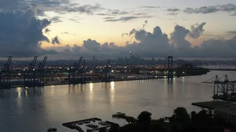 Sunset Drone Flight towards City of Philadelphia and Delaware River Stock Footage 137363395
