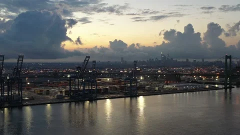 Sunset Drone Flight towards City of Philadelphia and Delaware River Stock Footage 137363396