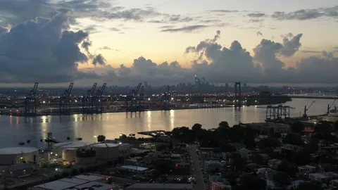 Sunset Drone Flight towards City of Philadelphia and Delaware River Stock Footage 137363401