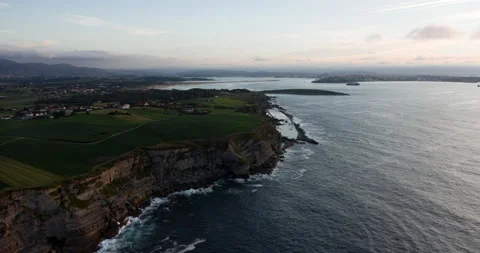 Sunset drone hyperlapse of Cliffs and Ocean in Spain 4K Stock Footage 137709740